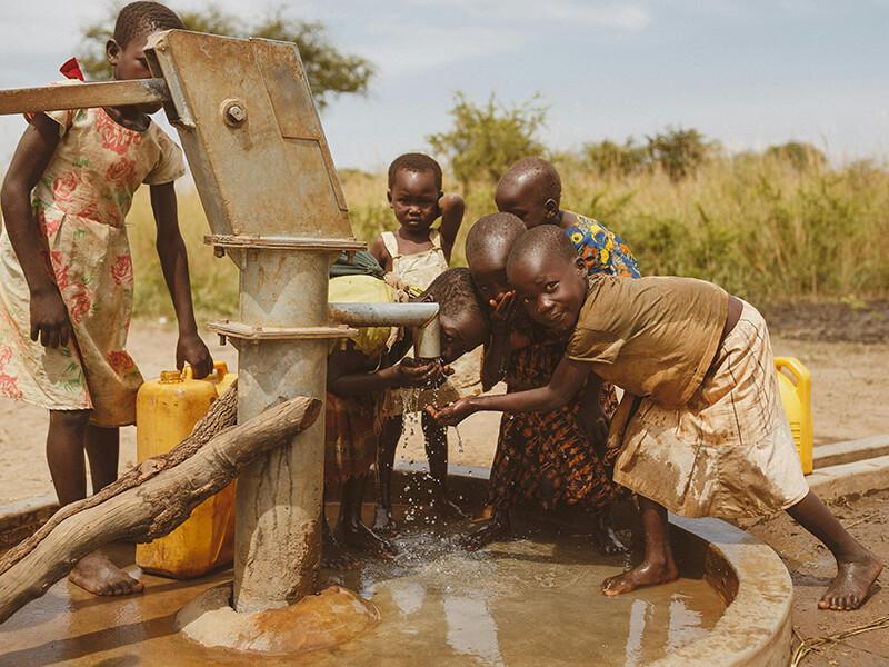 Children accessing clean borehole water