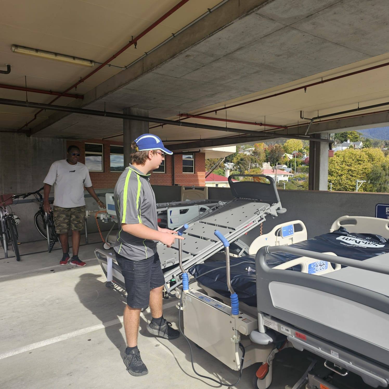 Hospital beds and medical equipment being collected